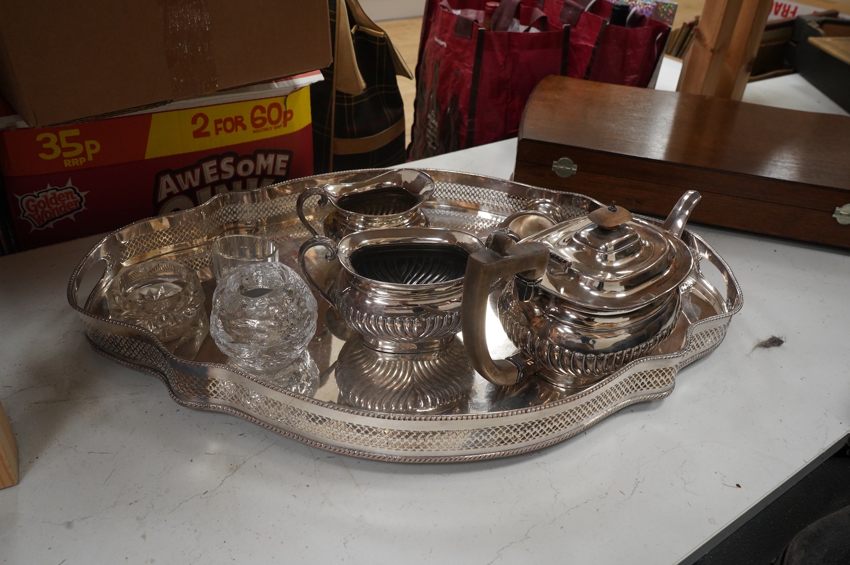 Webber & Hill, an oak cased canteen for six, a shaped galleried tea tray-60cm wide and tea service etc